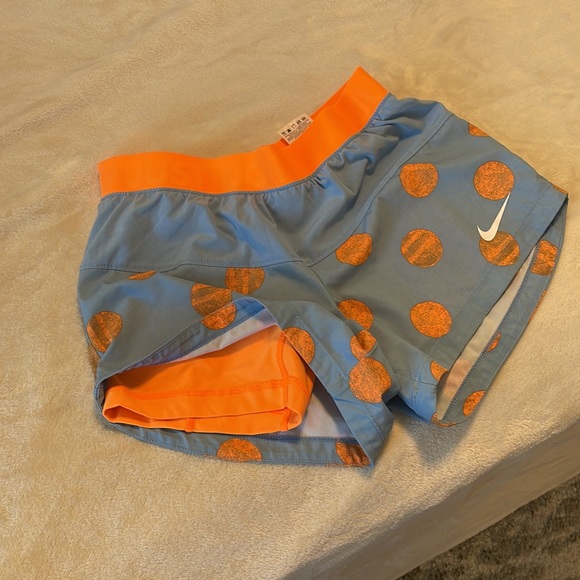 Nike dri-fit spandex shorts with loose layer over top - Picture 2 of 3